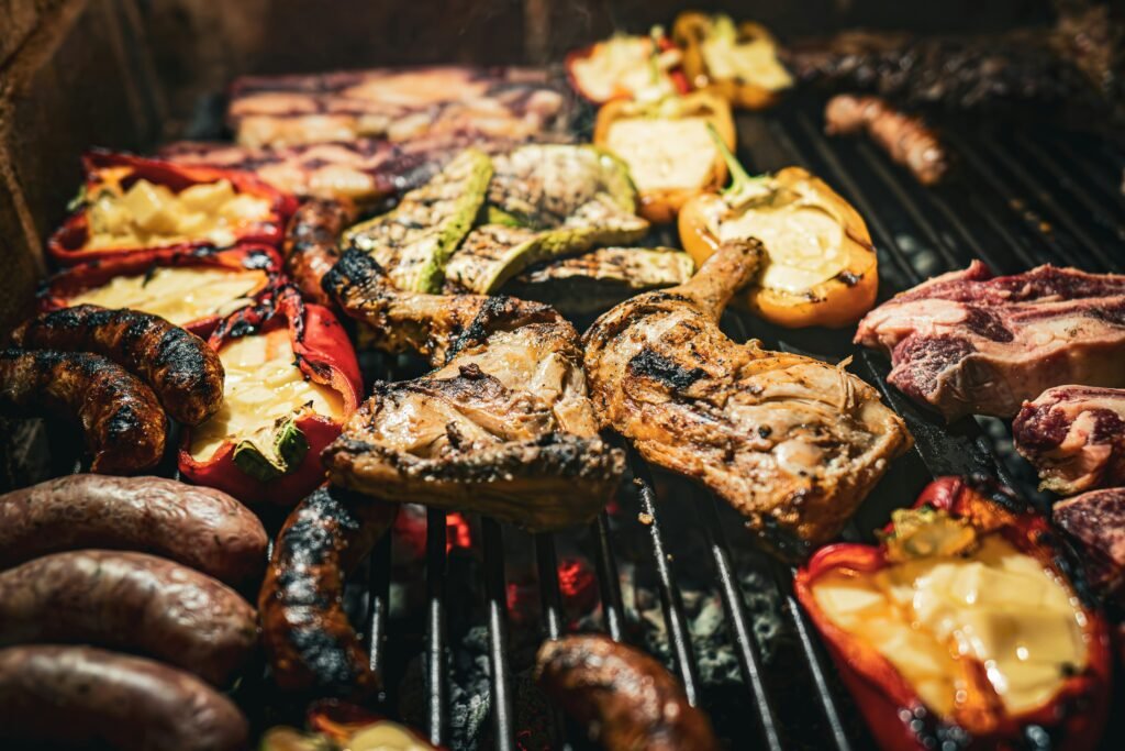 Grill loaded with sausages, chicken, steak and roasted peppers